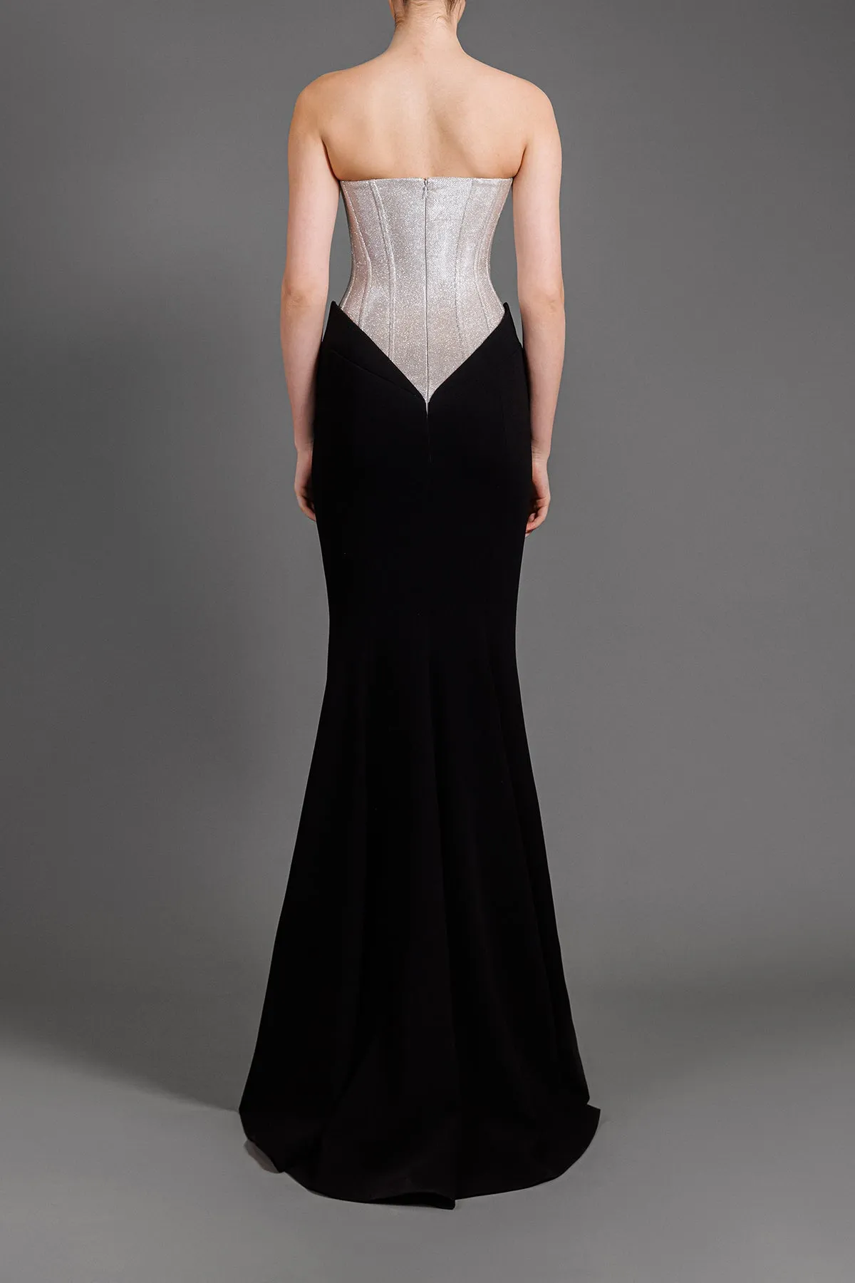 Beige and black strapless dress in lurex and crêpe with structured corset